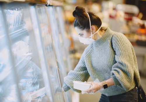 woman-protective-mask-supermarket_1157-34207